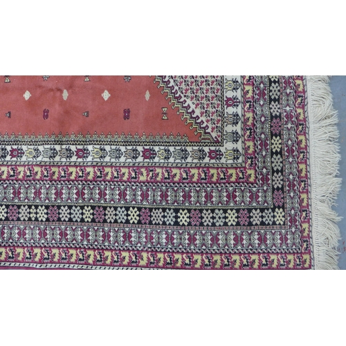 220 - 20th century Moroccan carpet / large rug, rose field with an hexagonal medallion in ivory, multiple ... 