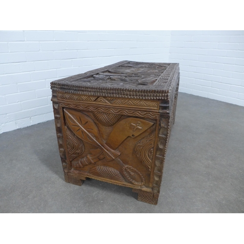 226 - West African wood linen  / blanket chest, probably Nigerian, carved with Benin type figures and weap... 