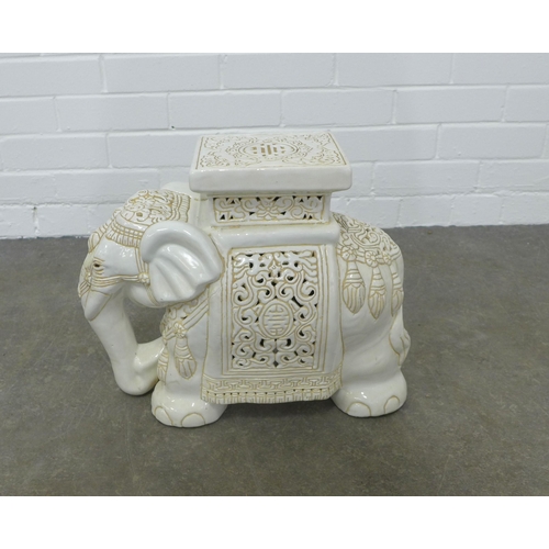 235 - A white glazed elephant pottery stool, 43 x 35cm.