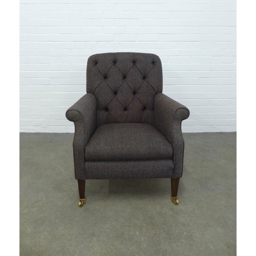 237 - A modern button back armchair, upholstered in dark brown tweed style fabric, on mahogany legs with b... 