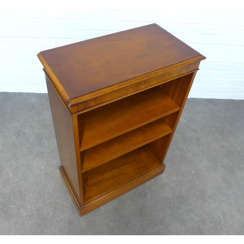 242 - A yew wood open bookcase on a plinth base, 60 x 92 x 32cm.