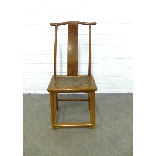 243 - Chinese yoke back chair, the wood with a golden hue, with a woven panel seat, legs united by  stretc... 