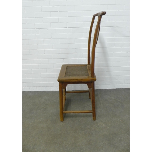 243 - Chinese yoke back chair, the wood with a golden hue, with a woven panel seat, legs united by  stretc... 