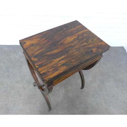 244 - 19th century coromandel / zebra wood card table, the fold over top with red baize interior over a si... 