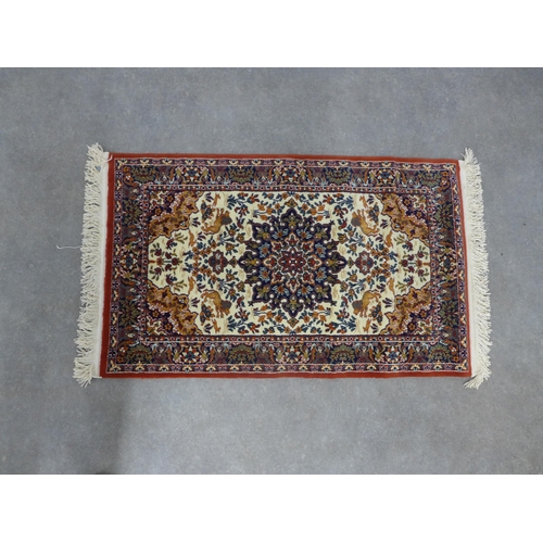 249 - Rami Persian style rug, allover foliate design, 145 x 80cm.