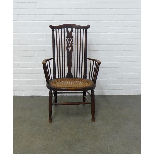 269 - Windsor style armchair with high back and cane work seat, 57 x 95 x 43cm.