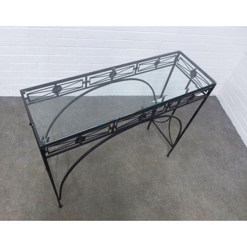 275 - Modern consol table, glass top on wrought iron supports,  92 x 80 x 31cm.