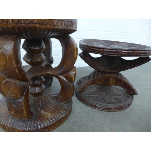 283 - Two West African carved hardwood stools, 38 x 43cm.