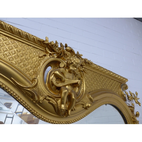 287 - Large 19th century French gilt pier mirror with scrolling crest with putto, with original serpentine... 