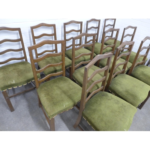 296 - Set of thirteen ladderback chairs, with green velvet stuff over seats 49 x 98 x 46cm.