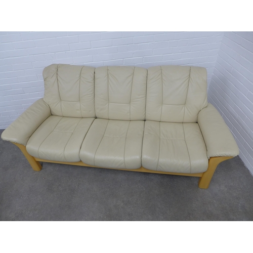 300 - Cream leather and beechwood three seater settee, 202 x 85 x 56cm.