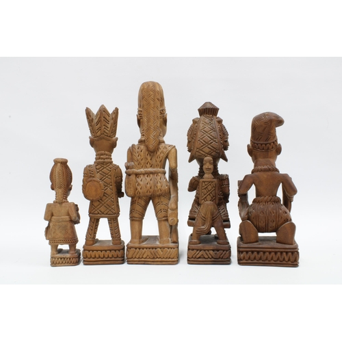 324 - Five various Nigerian carved wooden figures to include Yoruba, etc, tallest 31cm (5)