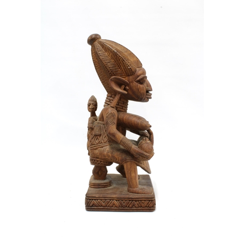 326 - Nigerian carved wood Yoruba maternity figure, 49cm high