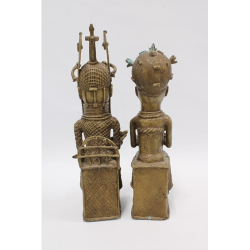 327 - A pair of Benin bronze King & Queen figures, each modelled seated on their thrones with their symbol... 