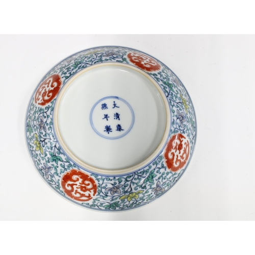 345 - Chinese dish decorated in Doucai five coloured enamels, bearing a Kangxi mark to the base but likely... 