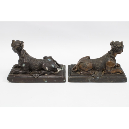 369 - A pair of bronze Sphinx figures on rectangular bases, 28cm long, (2)