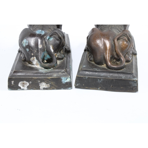 369 - A pair of bronze Sphinx figures on rectangular bases, 28cm long, (2)