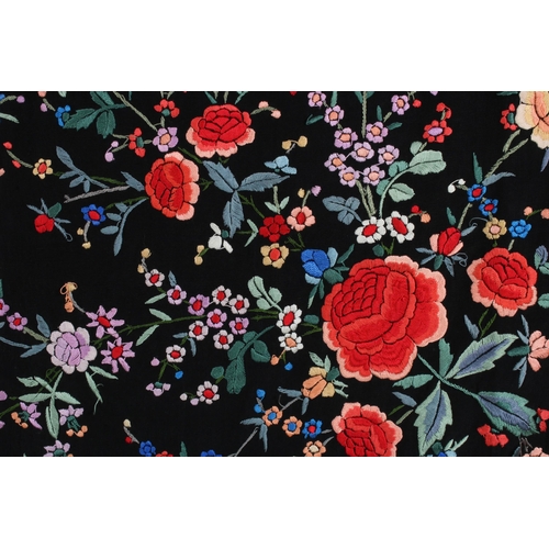 409 - Chinoiserie embroidered Manila / piano shawl, the silk black ground with floral embroidery, 132 x 12... 