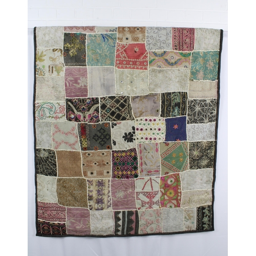 410 - Patchwork quilt, with some crewelwork and embroidered panels, and mirror applique, 155 x 100cm