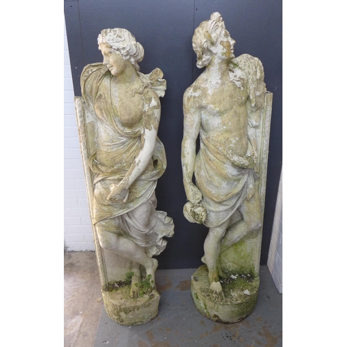 464 - A pair of composite garden statues, modelled as standing male and female classical figures, with lat... 