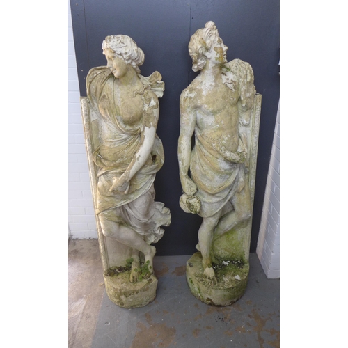 464 - A pair of composite garden statues, modelled as standing male and female classical figures, with lat... 