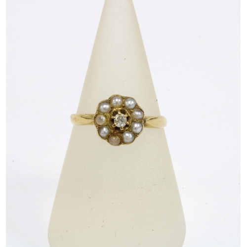 64 - Early 20th century diamond and seed pearl ring, stamped 18ct, size P