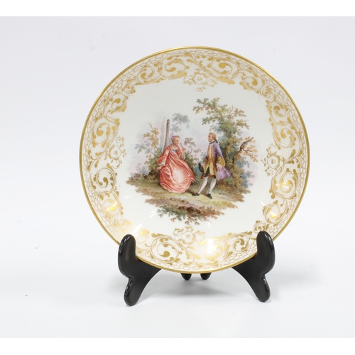 71 - 19th century Meissen saucer with garden scene within an intricate Sevres style border, blue crossed ... 