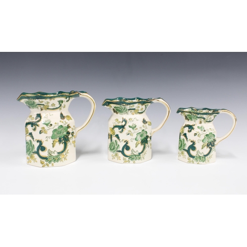 81 - A set of three Masons Ironstone Chartreuse pattern graduating jugs, (3) 16cm high.