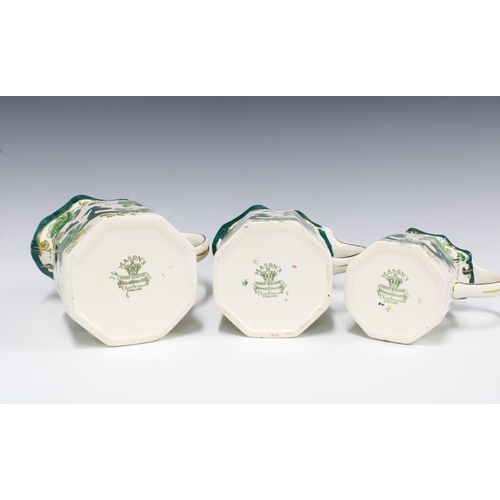 81 - A set of three Masons Ironstone Chartreuse pattern graduating jugs, (3) 16cm high.