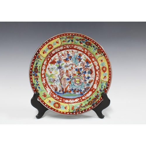 84 - Chinese Export porcelain plate with coloured enamels and underglaze blue flowers, iron red borders, ... 