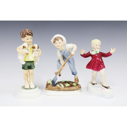 90 - Three Royal Worcester figures to include 'All Mine', 'Saturday's Child' & 'January', (3) 20cm.