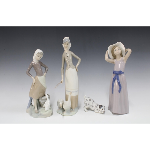 93 - Four Lladro porcelain figures (4) 28cm.