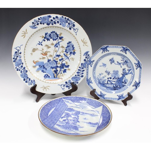 447 - 18th century Chinese blue and white plate, octagonal,  (restored, with losses) together with a large... 