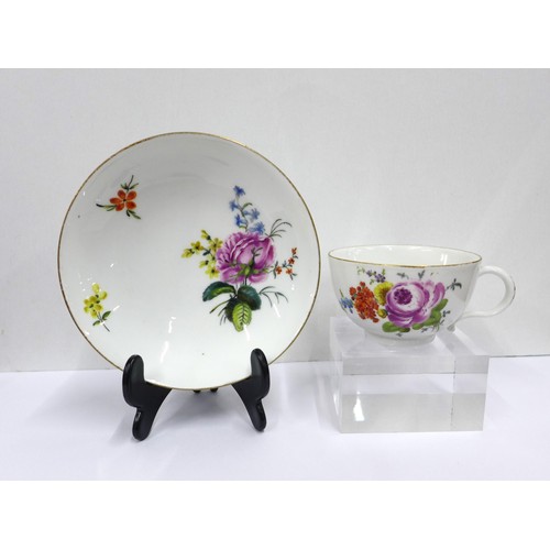 72 - Meissen floral decorated saucer and cup, blue crossed swords marks (2)