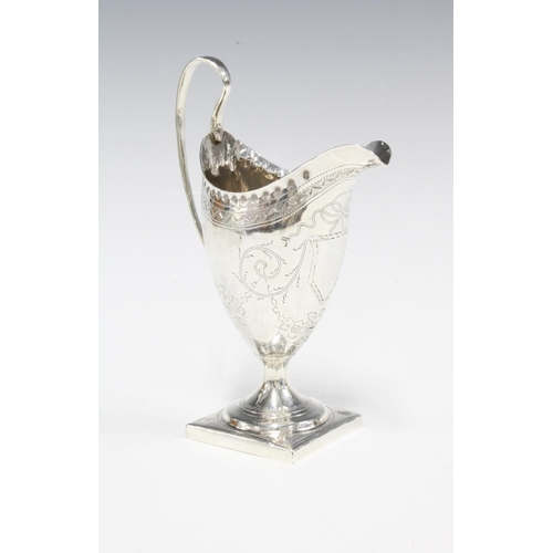 1 - George III silver cream jug, overstruck marks likely for George Gray, London 1791, of helmet form wi... 