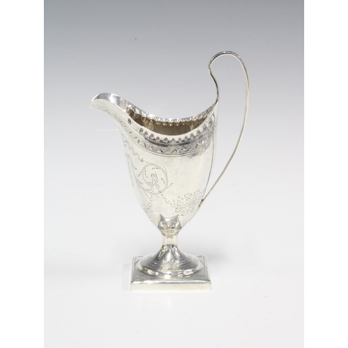 1 - George III silver cream jug, overstruck marks likely for George Gray, London 1791, of helmet form wi... 