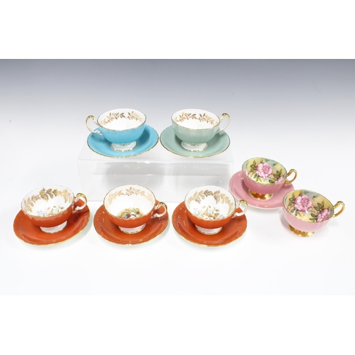 128 - Aynsley china cups and saucers, painted with flowers,  (13)