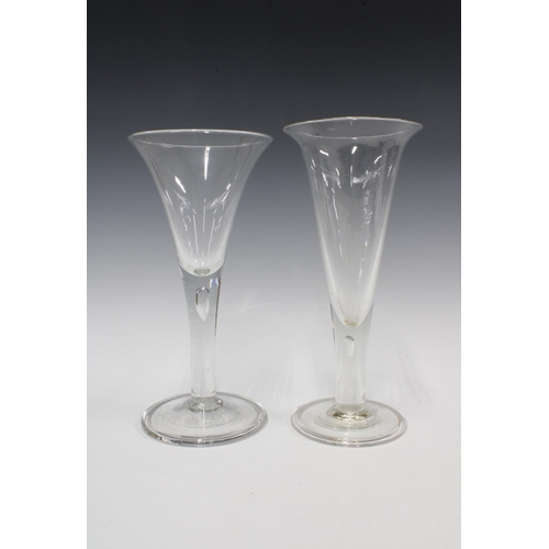 142 - Two oversized wine glasses with funnel bowls and air bubble stems,  26cm (2)