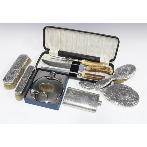 146 - A white metal backed four piece dressing table set, horn handled carving set. pewter hip flask and a... 