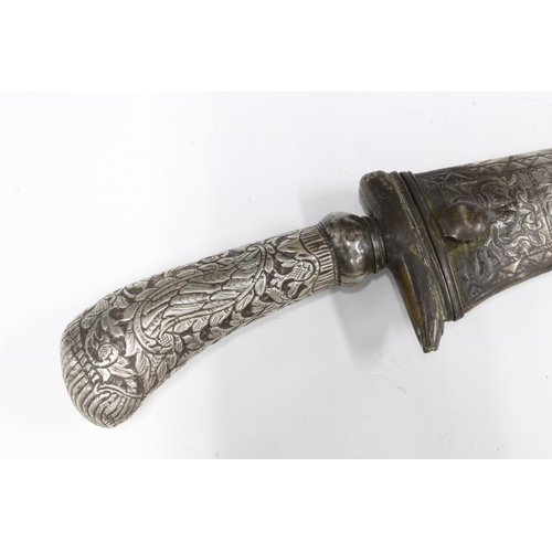 147 - An antique Eastern dagger with engraved blade, white metal handle and sheaf, overall length 58cm tog... 