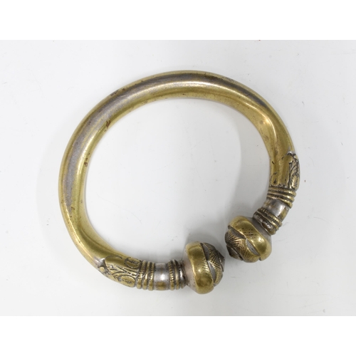 149 - A heavy silverplated brass Salve style bangle