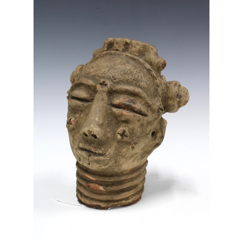 150A - Krinjabo Memorial Head, Cote D'Ivoire, a terracotta head with ringed neck and facial scarification, ... 