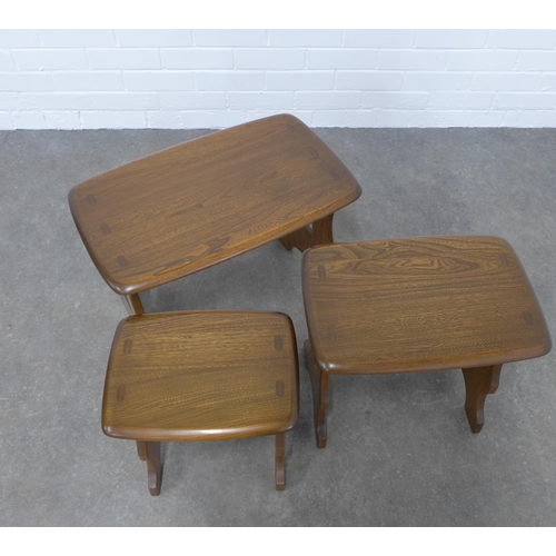 205 - An Ercol golden Dawn elm nest of three tables, 57 x 42 x 35cm. (3)