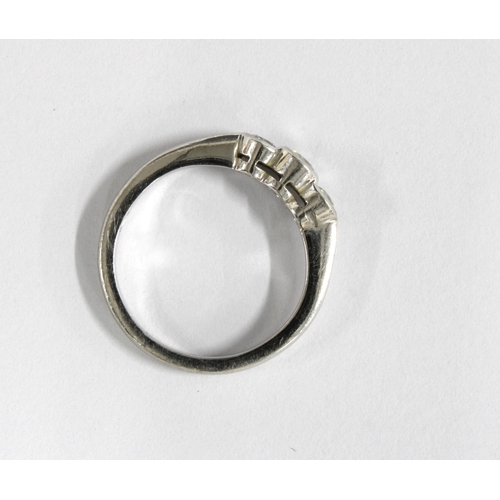 21 - Platinum London 2001 three stone diamond ring, size H.