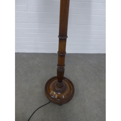 218 - Mahogany fluted standard lamp and shade, 163cm.