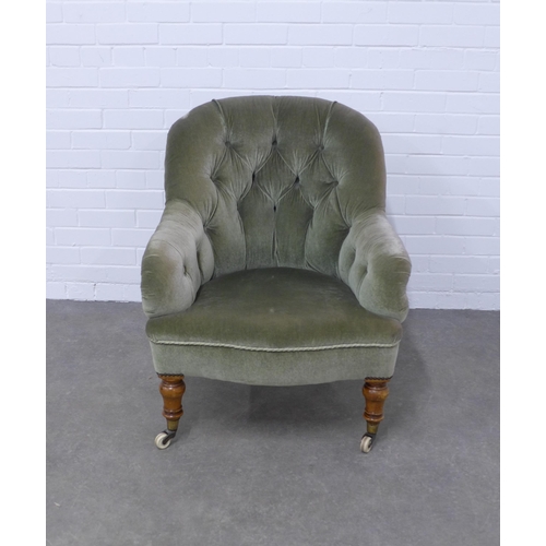 221 - 19th century green upholstered buttonback armchair, mahogany legs with ceramic castors, 68 x 85 x 52... 