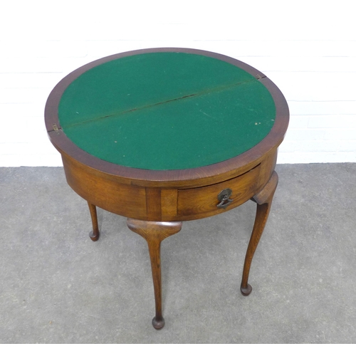 226 - An oak demi-lune foldover card table, 77 x77 x 38cm.