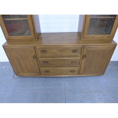 257 - An Ercol Golden Dawn cabinet, 155 x 160 x 46cm.