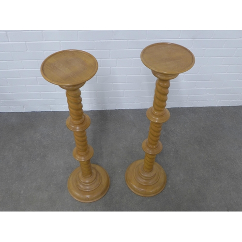 265 - Pair of beechwood torchere stands, 24 x 100cm. (2)