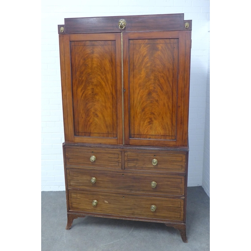 282 - Georgian mahogany linen press, stepped pediment above a pair of flame veneered doors, internal brass... 